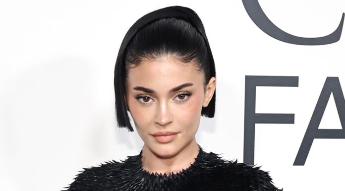 Kylie Jenner Strikes a Bold Pose with Daring Paris Fashion Week Outfit