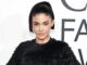 Kylie Jenner Strikes a Bold Pose with Daring Paris Fashion Week Outfit