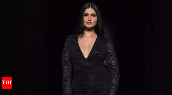 Tara Sutaria channeled Morticia Addams on the runway, bringing a touch of darkness to the ramp.