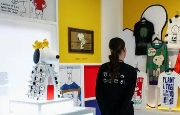 Snoopy, the beloved Peanuts character, is celebrated in a new Parisian exhibition that showcases his enduring style and influence on the world of fashion.