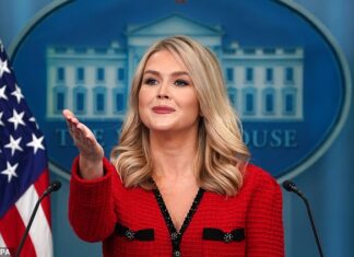 Karoline Leavitt’s “frumpy” fashion is a deliberate choice that sends a secret message to critics, showcasing innovative and subversive style.