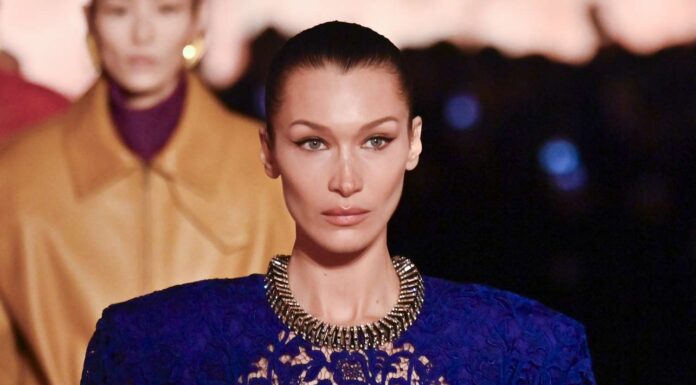 Bella Hadid closed out the Saint Laurent Paris Fashion Week runway in a stunning sheer dress.