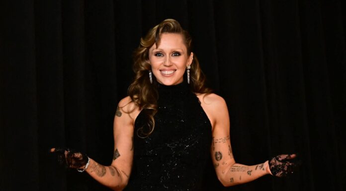 Miley Cyrus explores her deep connection to fashion on her new single “Something Beautiful”.