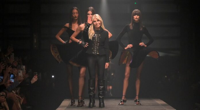 Donatella Versace steps down as designer at Versace, succeeded by Dario Vitale as the new creative head.
