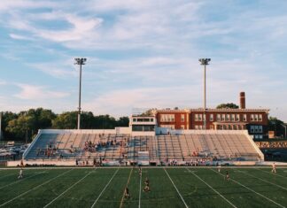 The title “Fashion show in a stadium? Discover iconic moments when the runway took over major sports venues” can be rewritten as: “Fashion shows have conjured iconic moments by taking over major sports venues, spotlighting style on the runway”.