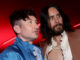 Jared Leto and Barry Keoghan reunite at the Valentino show during Paris Fashion Week, where they were spotted mingling with models and celebrities.
