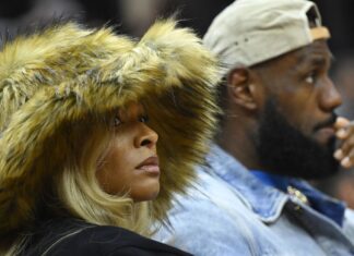 Savannah James shows off her sense of style as she wears a fantastic outfit that is a rare fashion success on the Lakers sidelines.